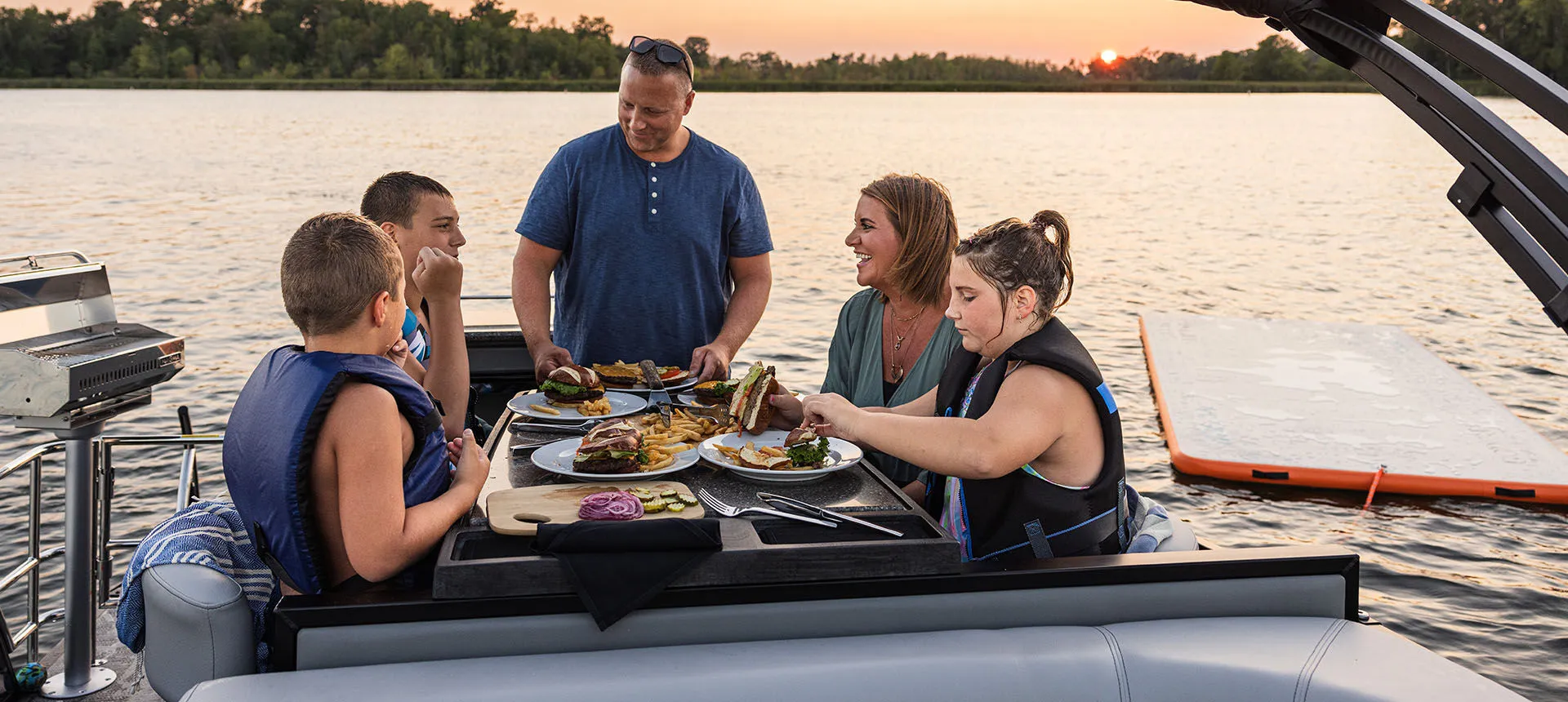 Family enjoying time on a boat