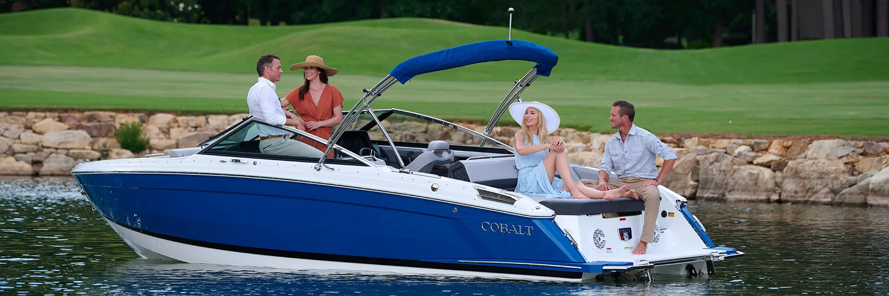Group enjoying a boat on the water