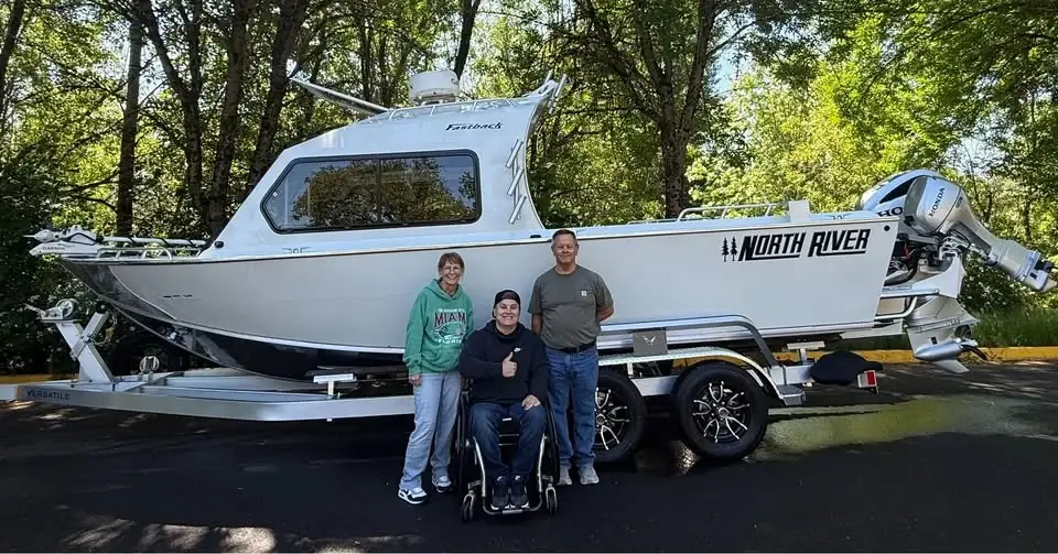 Clemens Marina customers with their new North River Seahawk Fastback