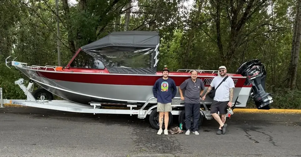 Clemens Marina customers with their new North River