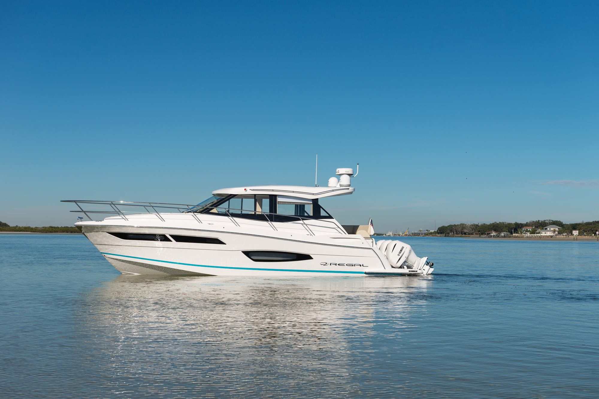 Regal 38 Xo boat sitting on water