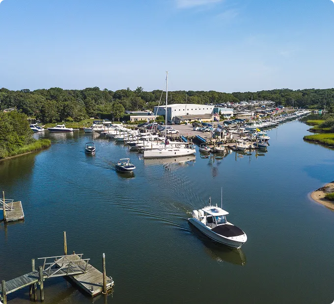 Strong's Marine facility in Mattituck Bay with boats ready for demo