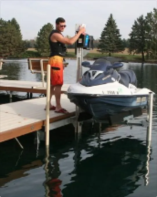 Personal watercraft raised on a ShoreStation lift