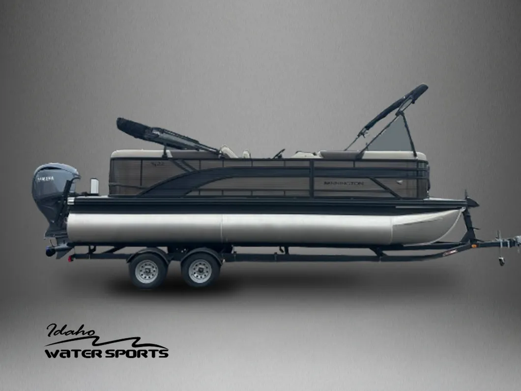 Wake boat carving across an Idaho lake