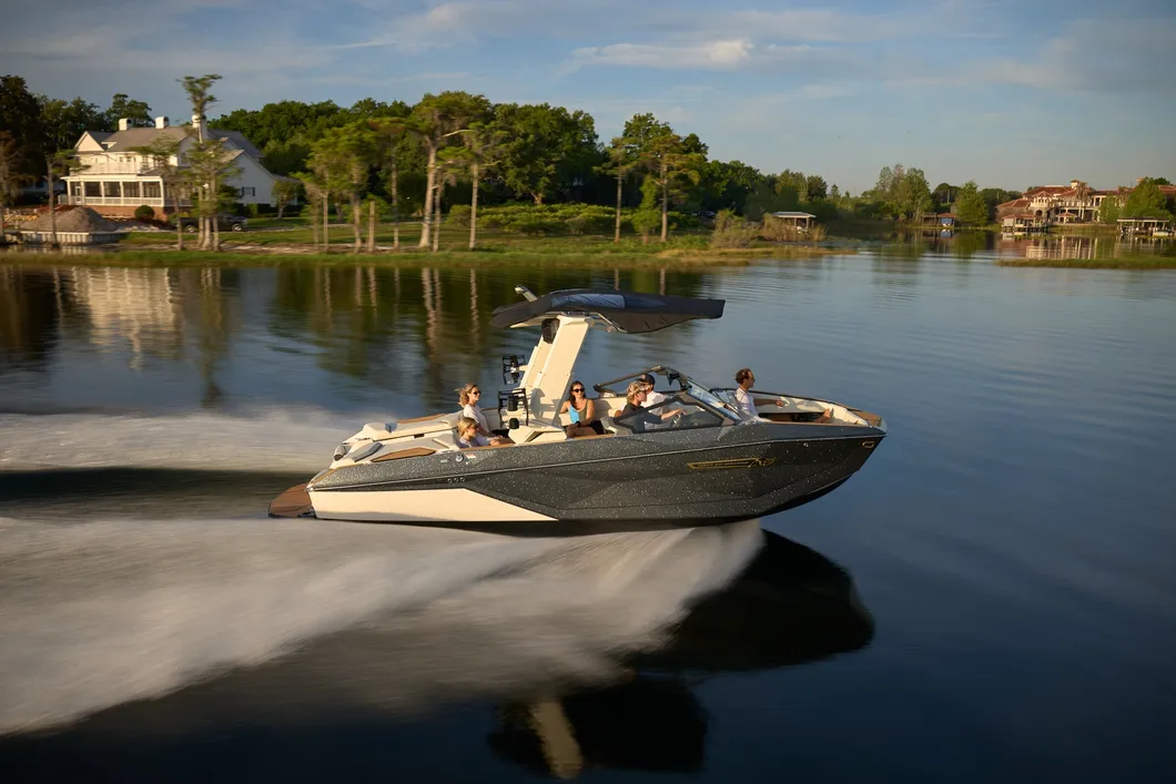 Wake boat carving across an Idaho lake