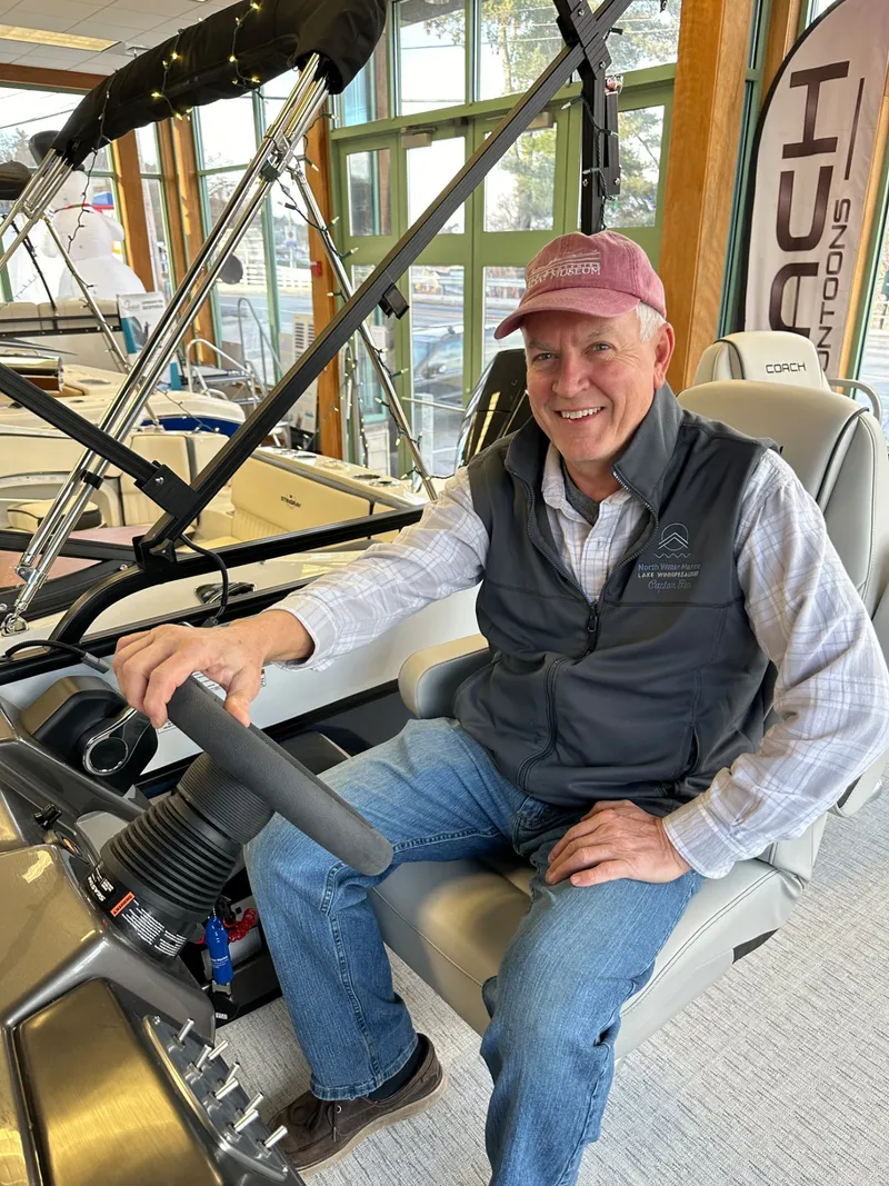 Captain Tim at the helm