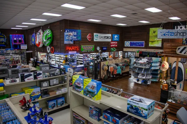 Organized shelves of marine engine parts and components at South Austin Marine