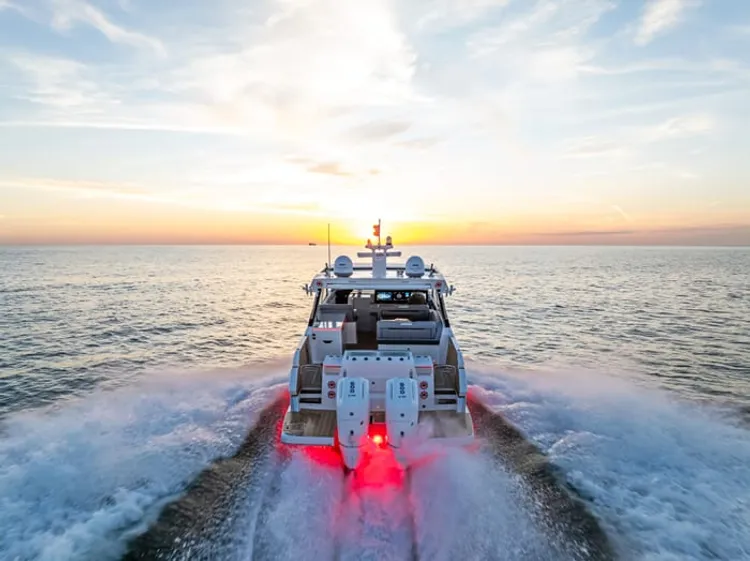 Boat running at dusk with integrated lighting and electronics