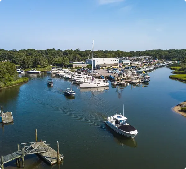 Strong's Marine facility in Mattituck Bay with boats ready for demo
